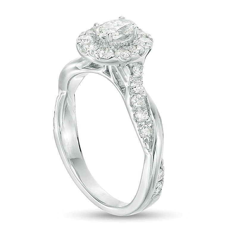 0.88 CT. TW Oval Diamond Frame Twist Shank Engagement Ring in 10K White Gold