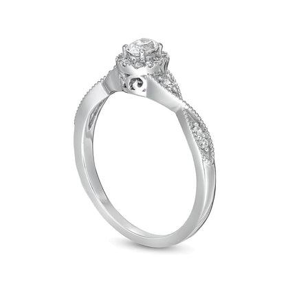 0.33 CT. TW Oval Diamond Frame Twist Shank Engagement Ring in 14K White Gold (I/SI2)