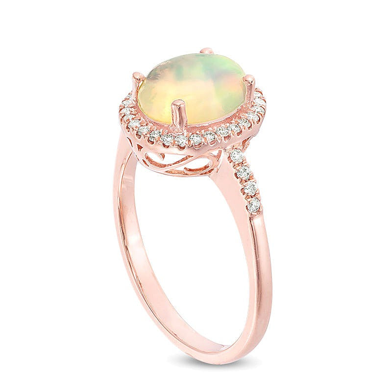 Oval Opal and 0.17 CT. TW Diamond Frame Ring in 14K Rose Gold