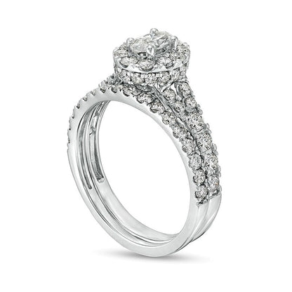 1.5 CT. TW Oval Diamond Frame Split Shank Bridal Set in 10K White Gold