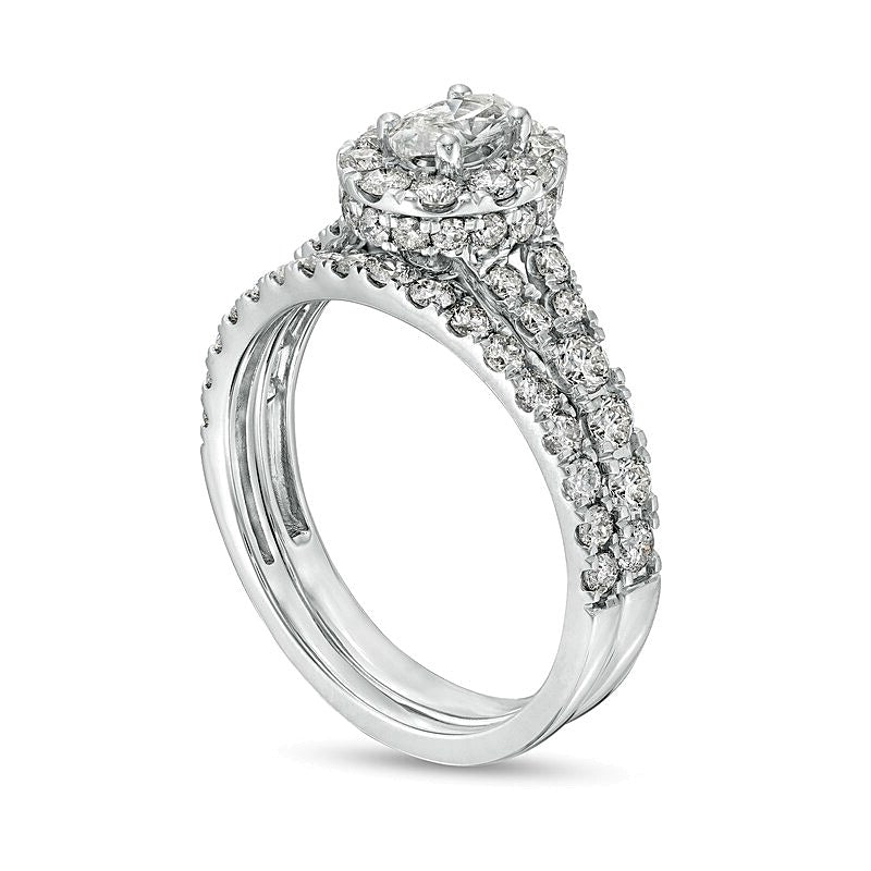 1.5 CT. TW Oval Diamond Frame Split Shank Bridal Set in 10K White Gold
