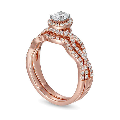 1.0 CT. TW Oval Diamond Frame Split Shank Bridal Set in 14K Rose Gold (I/I2)