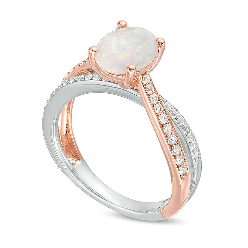 Oval Opal and 0.25 CT. TW Diamond Crossover Ring in Sterling Silver and Rose Rhodium