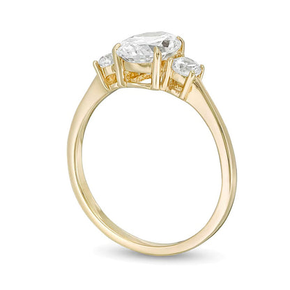 1.25 CT. TW Oval and Round Diamond Three Stone Engagement Ring in 14K Gold