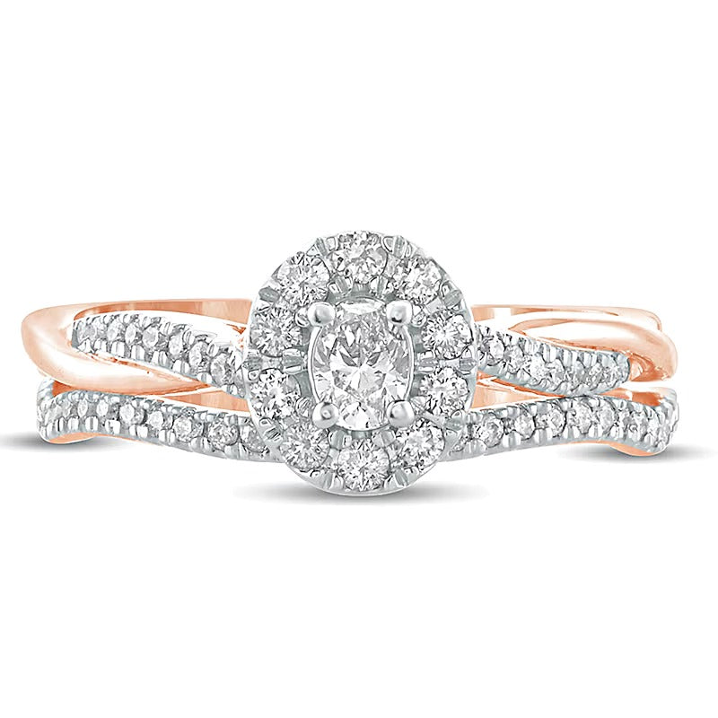 0.5 CT. TW Oval Diamond Frame Twist Shank Bridal Set in 10K Rose Gold
