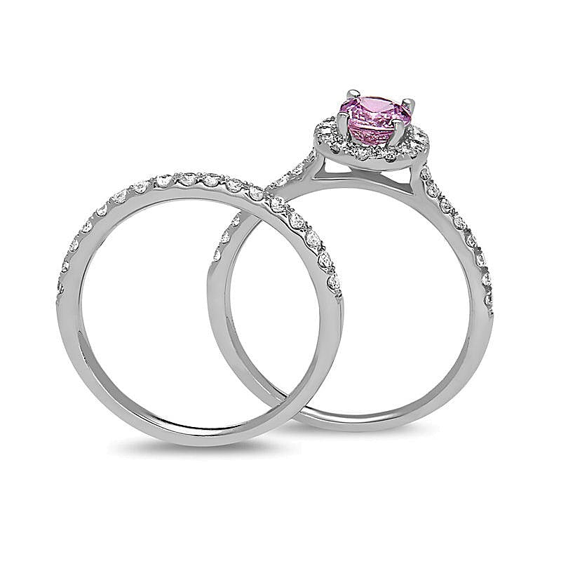 Oval Pink Sapphire and 0.63 CT. TW Diamond Frame Bridal Set in 14K White Gold