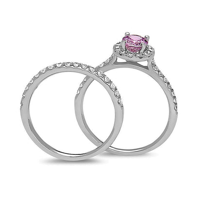 Oval Pink Sapphire and 0.63 CT. TW Diamond Frame Bridal Set in 14K White Gold