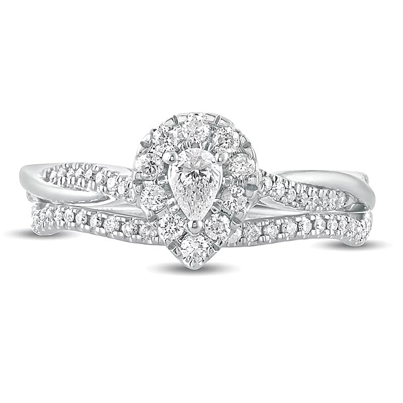 0.5 CT. TW Pear-Shaped Diamond Frame Twist Shank Bridal Set in 10K White Gold