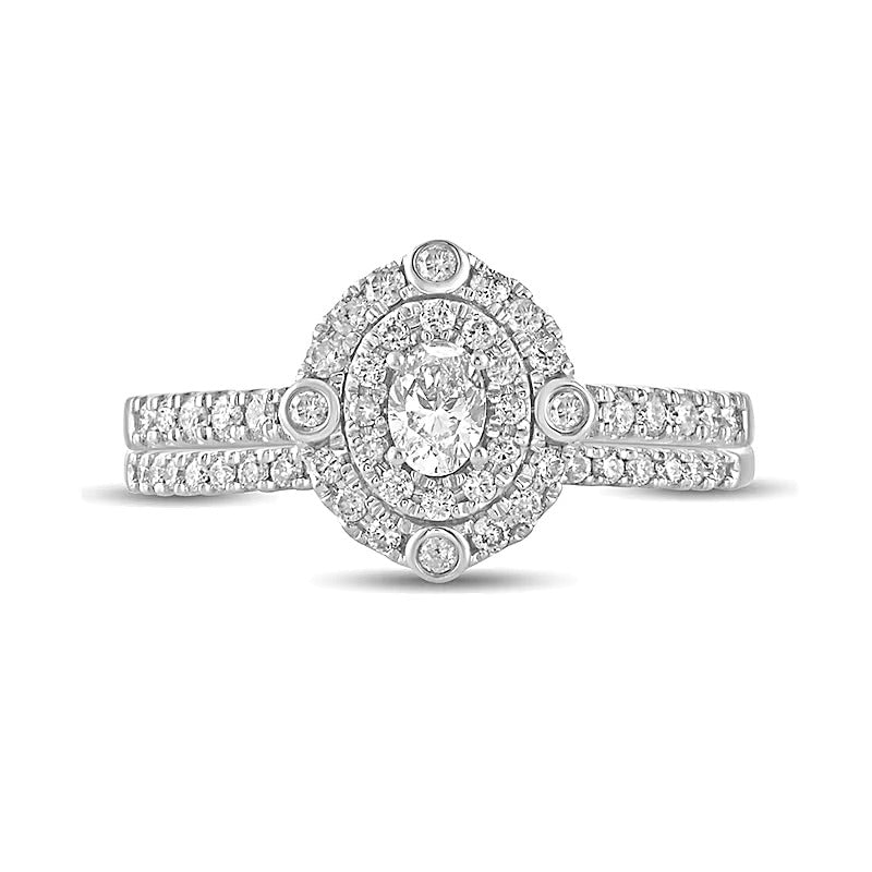 0.63 CT. TW Oval Diamond Double Frame Bridal Set in 10K White Gold