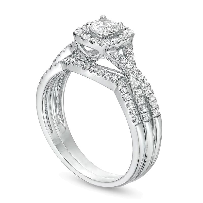 0.75 CT. TW Diamond Cushion-Shaped Frame Twist Shank Bridal Set in 14K White Gold (I/I2)