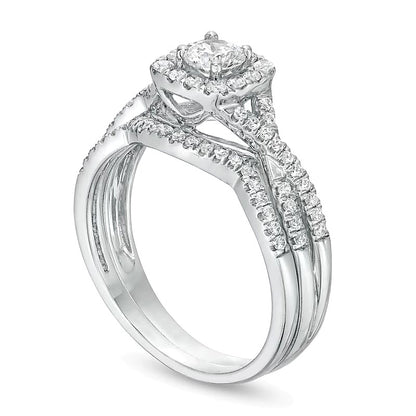 0.75 CT. TW Diamond Cushion-Shaped Frame Twist Shank Bridal Set in 14K White Gold (I/I2)