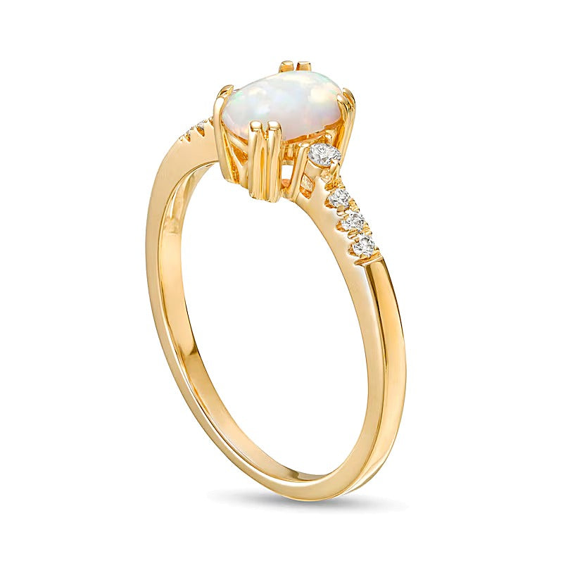Oval Lab-Created Opal Cabochon and 0.1 CT. TW Diamond Ring in 10K Gold