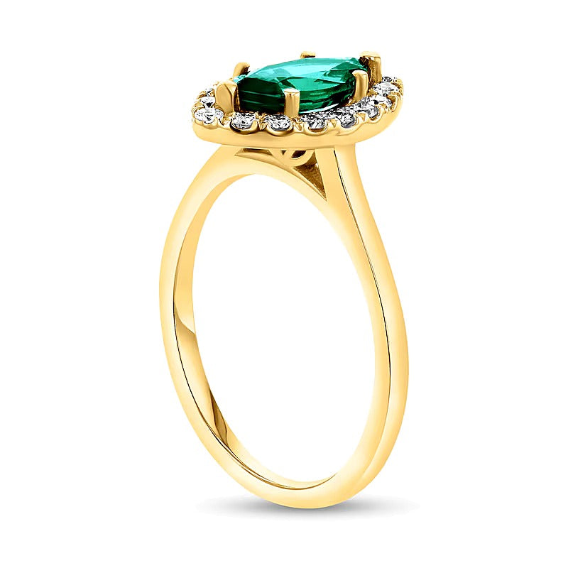Marquise Emerald and 0.25 CT. TW Diamond Frame Ring in 14K Gold