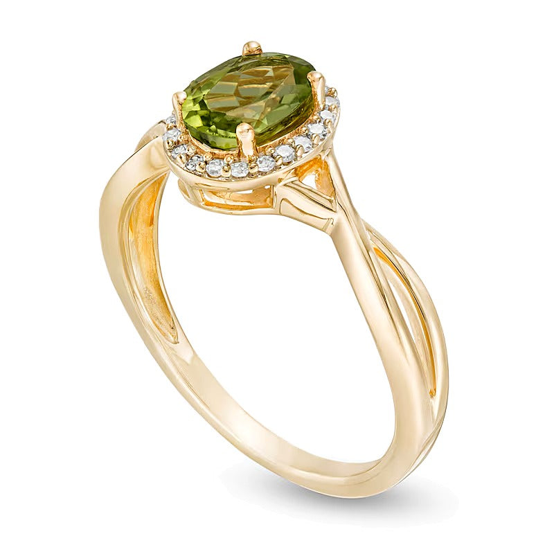 Oval Peridot and 0.07 CT. TW Diamond Frame Twist Shank Ring in 10K Gold