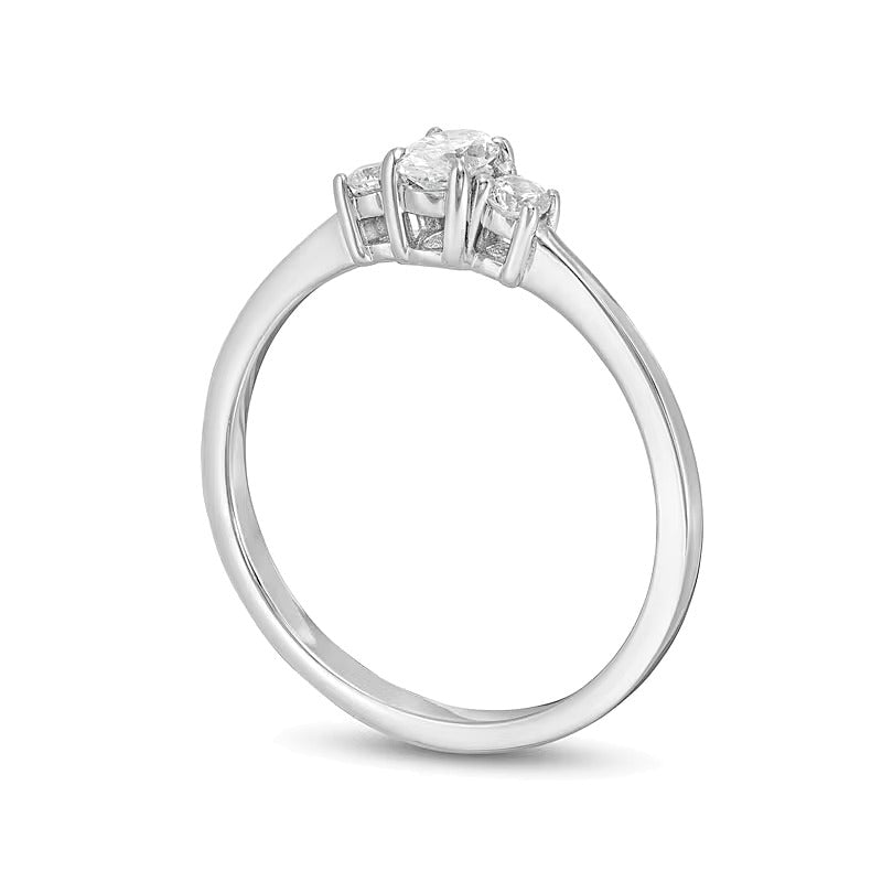 0.5 CT. TW Oval and Round Diamond Three Stone Engagement Ring in 14K White Gold