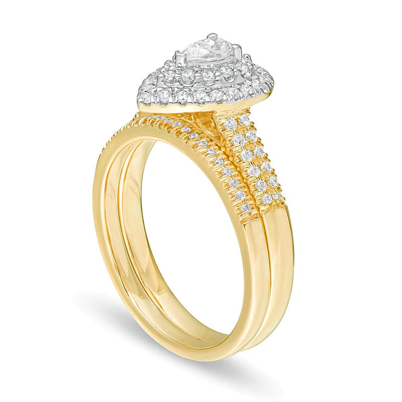 0.75 CT. TW Pear-Shaped Diamond Double Frame Bridal Set in 14K Gold