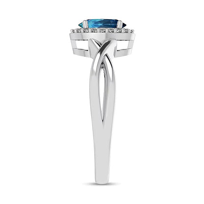 Oval Swiss Blue Topaz and 0.07 CT. TW Diamond Frame Crossover Shank Ring in 10K White Gold