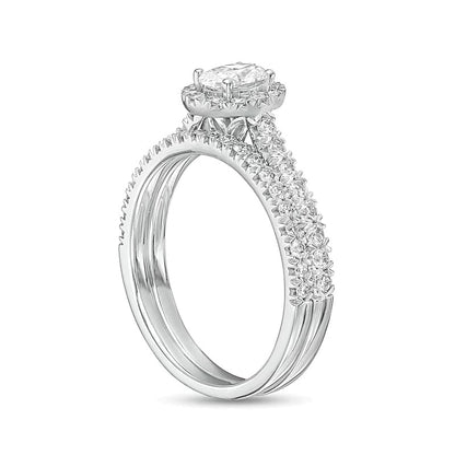 1.0 CT. TW Oval Diamond Frame Bridal Set in 10K White Gold
