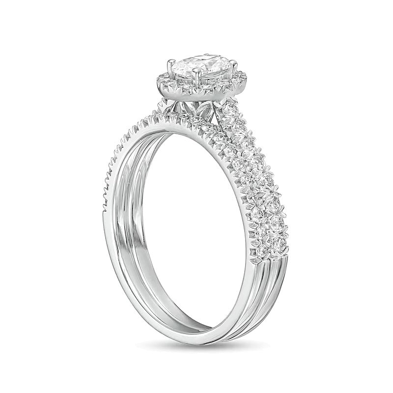 1.0 CT. TW Oval Diamond Frame Bridal Set in 10K White Gold