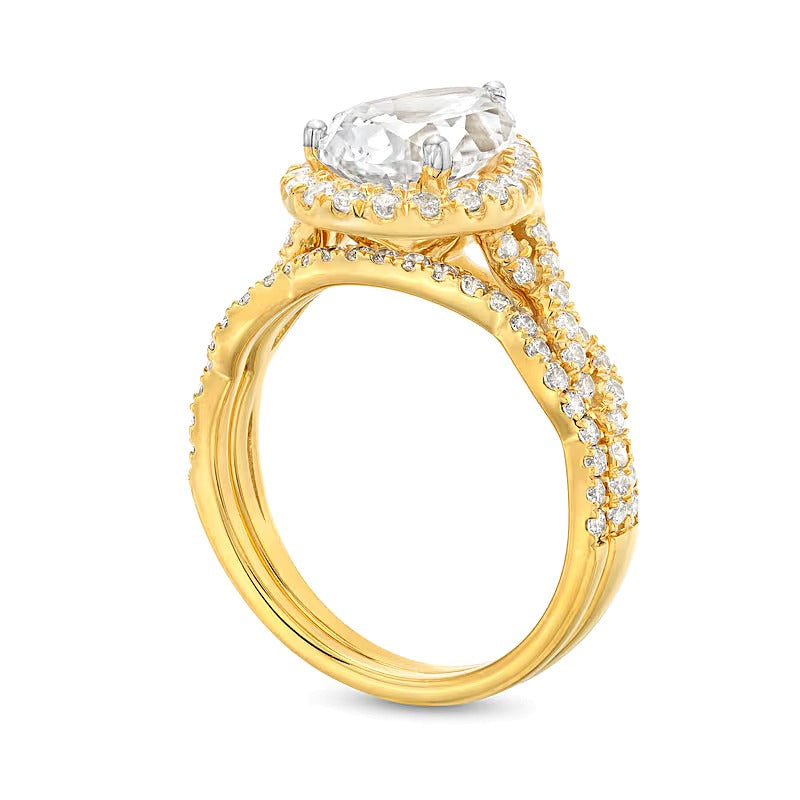 2.63 CT. TW Pear-Shaped Lab-Grown Diamond Frame Twist Shank Bridal Set in 14K Gold (I/SI2)