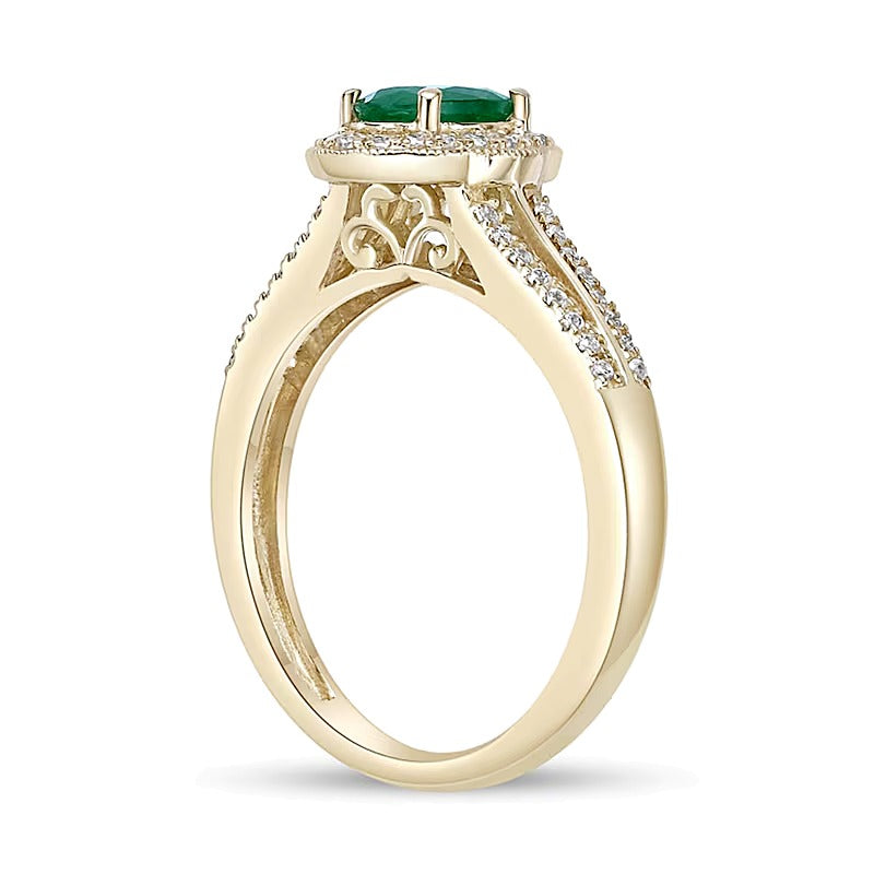 Oval Emerald and 0.25 CT. TW Diamond Frame Split Shank Ring in 10K Gold