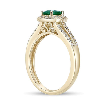Oval Emerald and 0.25 CT. TW Diamond Frame Split Shank Ring in 10K Gold