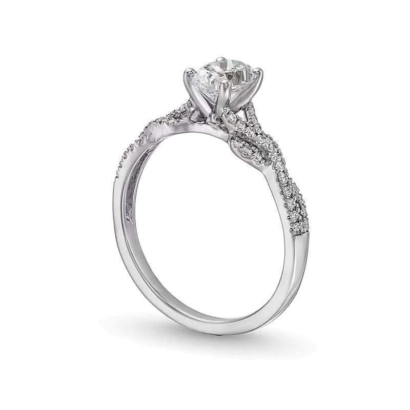 0.75 CT. TW Oval Diamond Twist Shank Engagement Ring in 14K White Gold