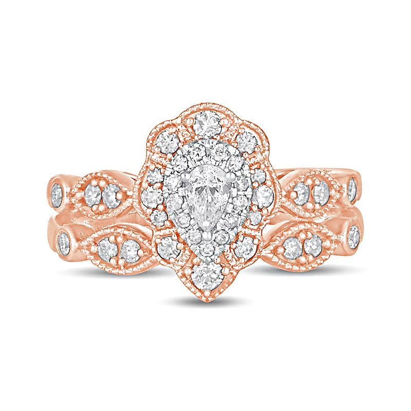 0.63 CT. TW Pear-Shaped Diamond Double Petal Frame Vintage-Style Bridal Set in 10K Rose Gold