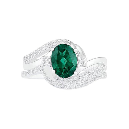 Oval Lab-Created Emerald and White Sapphire Side Accent Double Bypass Split Shank Bridal Set in Sterling Silver