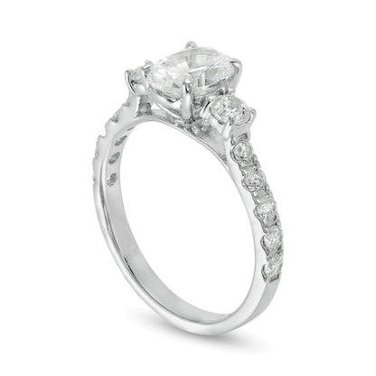 1.75 CT. TW Oval and Round Diamond Three Stone Engagement Ring in 14K White Gold