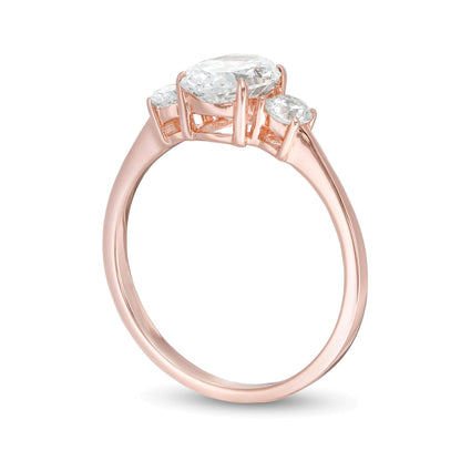 1.25 CT. TW Oval and Round Diamond Three Stone Engagement Ring in 14K Rose Gold