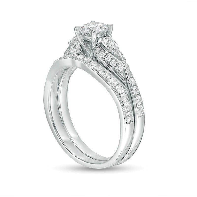 1.38 CT. TW Diamond Bypass Three Stone Bridal Set in 14K White Gold