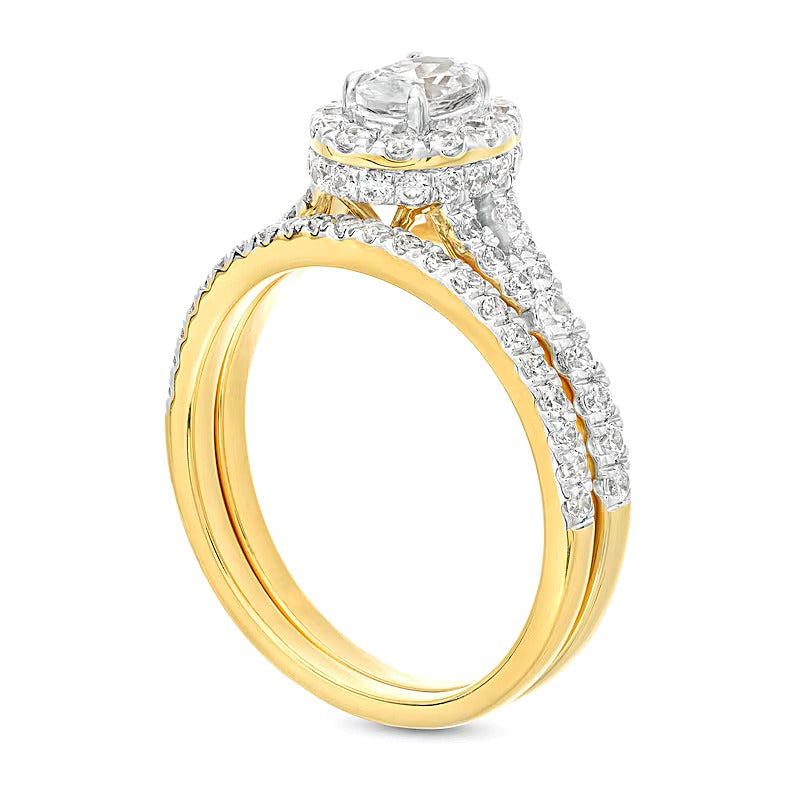 1.25 CT. TW Oval Diamond Frame Split Shank Bridal Set in 14K Gold