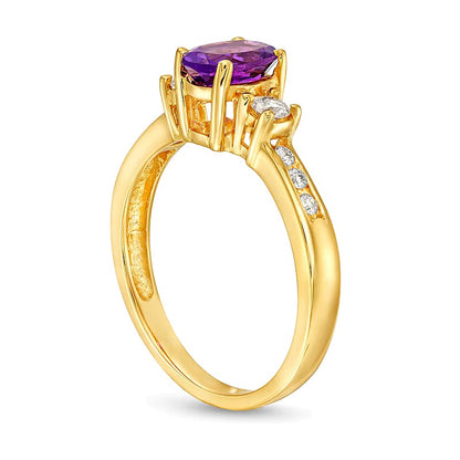 Oval Amethyst and 0.25 CT. TW Diamond Three Stone Ring in 14K Gold