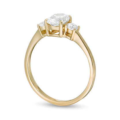 1.0 CT. TW Oval and Round Diamond Three Stone Engagement Ring in 14K Gold