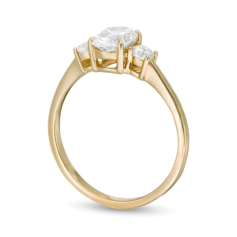 1.0 CT. TW Oval and Round Diamond Three Stone Engagement Ring in 14K Gold