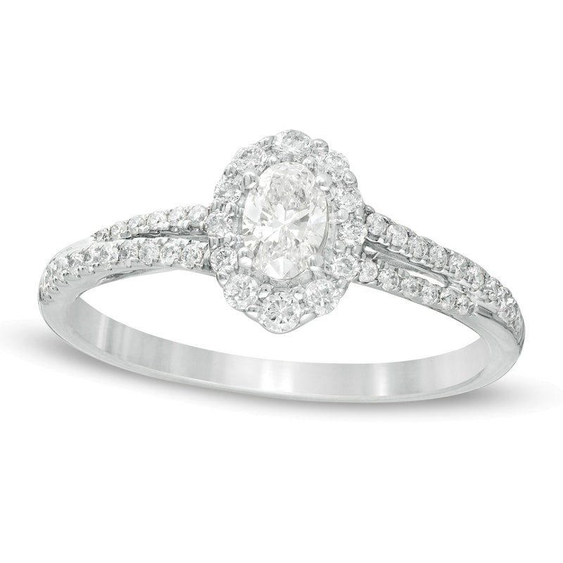 0.5 CT. TW Oval Diamond Frame Split Shank Engagement Ring in 10K White Gold