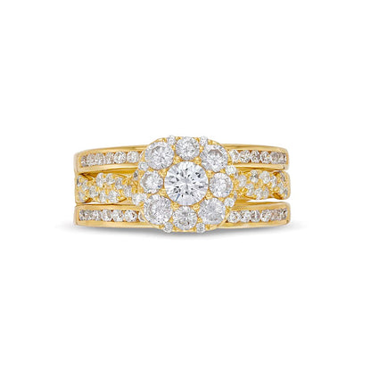 1.5 CT. TW Cushion Multi-Diamond Twist Shank Three Piece Bridal Set in 10K Gold