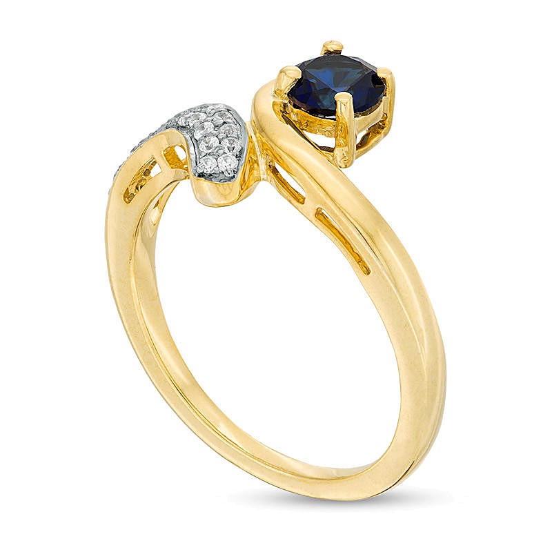 5.0mm Lab-Created Blue Sapphire and 0.1 CT. TW Diamond Bypass Ring in Sterling Silver with 14K Gold Plate