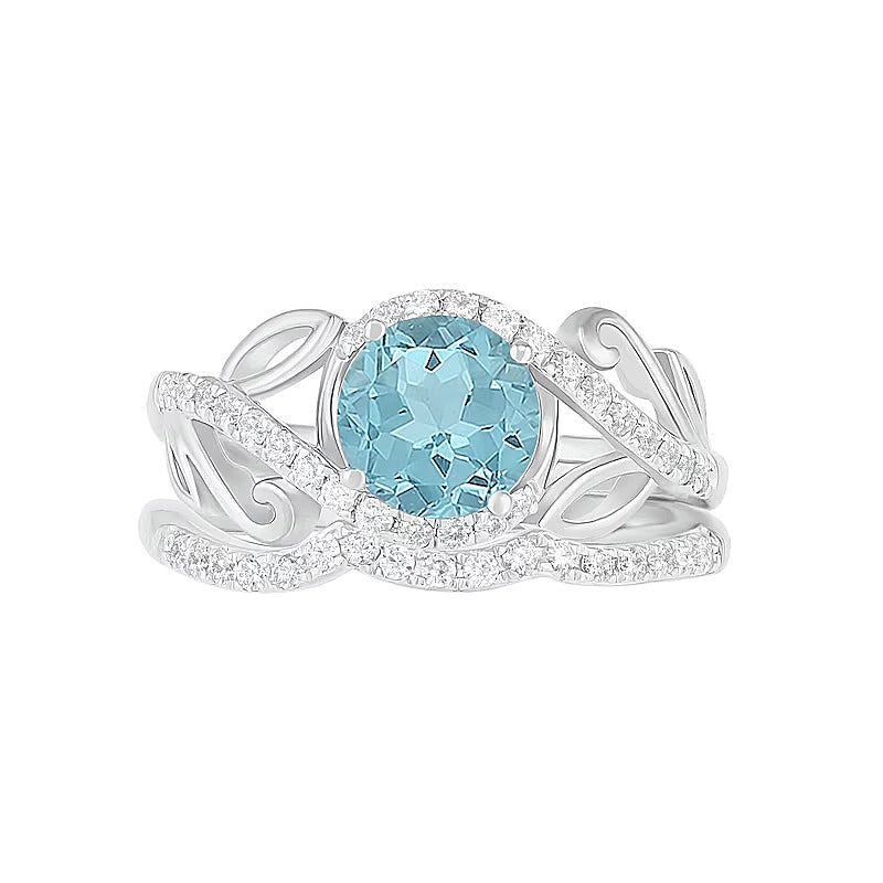 7.0mm Aquamarine and 0.38 CT. TW Diamond Bypass Leaf Shank Bridal Set in 10K White Gold