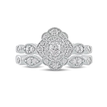 0.63 CT. TW Oval Diamond Double Petal Frame Vintage-Style Bridal Set in 10K White Gold