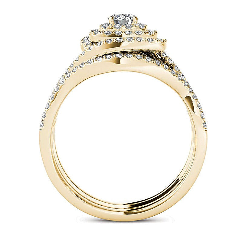 1.0 CT. TW Diamond Cushion Frame Split Shank Three Piece Bridal Set in 14K Gold