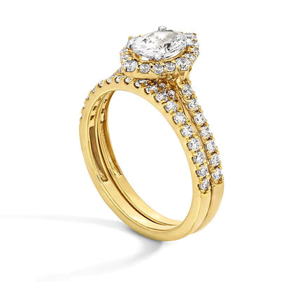 1.5 CT. TW Oval Diamond Frame Bridal Set in 14K Gold