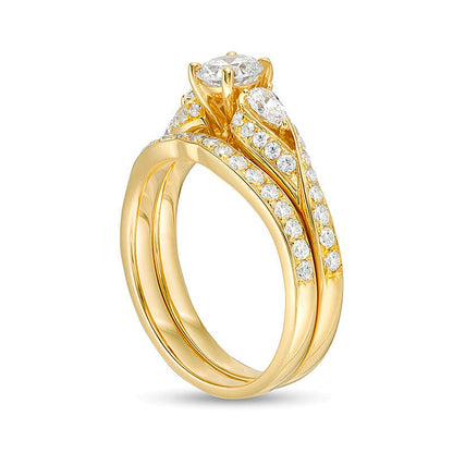 1.38 CT. TW Diamond Bypass Ribbon Three Stone Bridal Set in 14K Gold