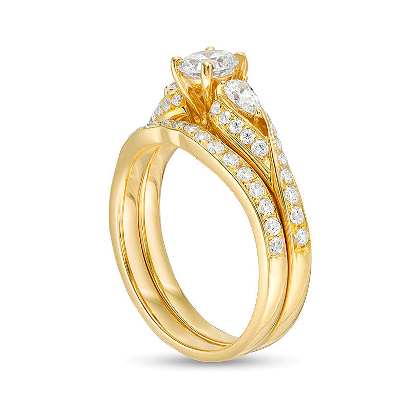 1.38 CT. TW Diamond Bypass Ribbon Three Stone Bridal Set in 14K Gold
