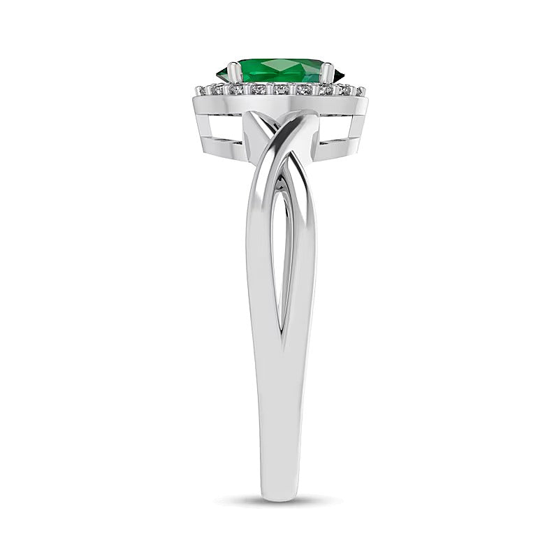 Oval Emerald and 0.07 CT. TW Diamond Frame Crossover Shank Ring in 10K White Gold