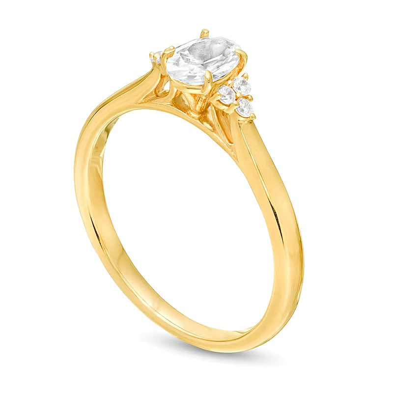 0.63 CT. TW Oval Diamond Tri-Sides Engagement Ring in 14K Gold