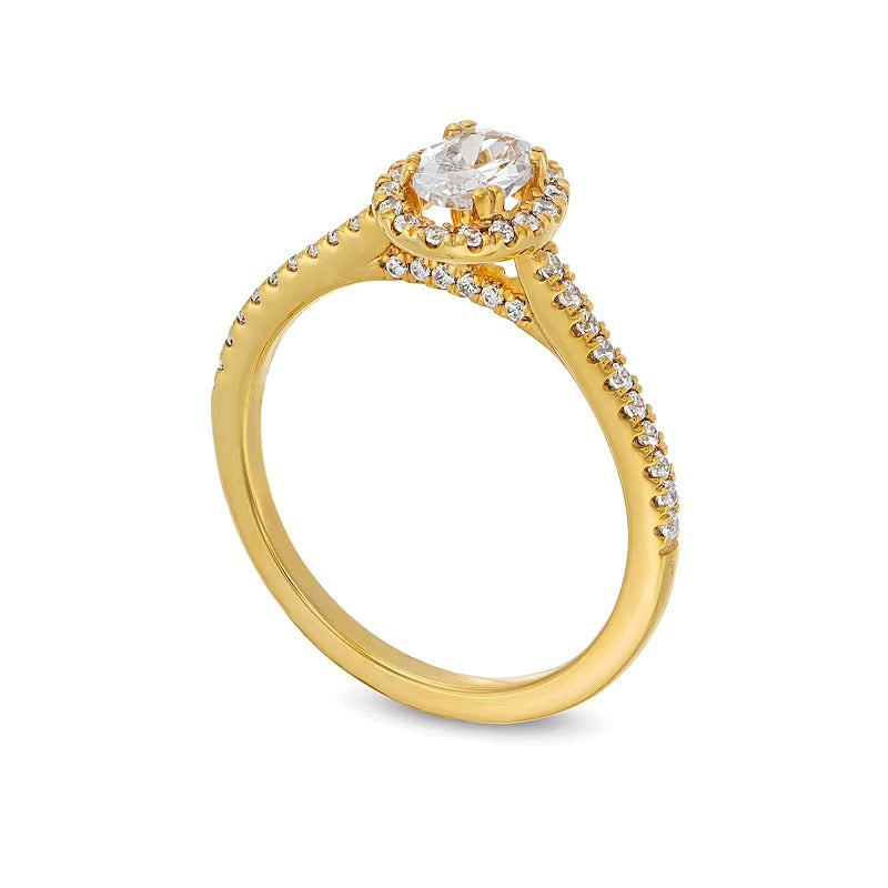0.75 CT. TW Oval Diamond Frame Engagement Ring in 14K Gold