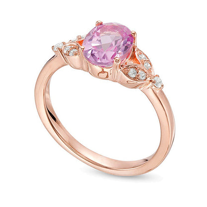 Oval Lab-Created Pink Sapphire and 0.1 CT. TW Diamond Leaf Sides Ring in 10K Rose Gold