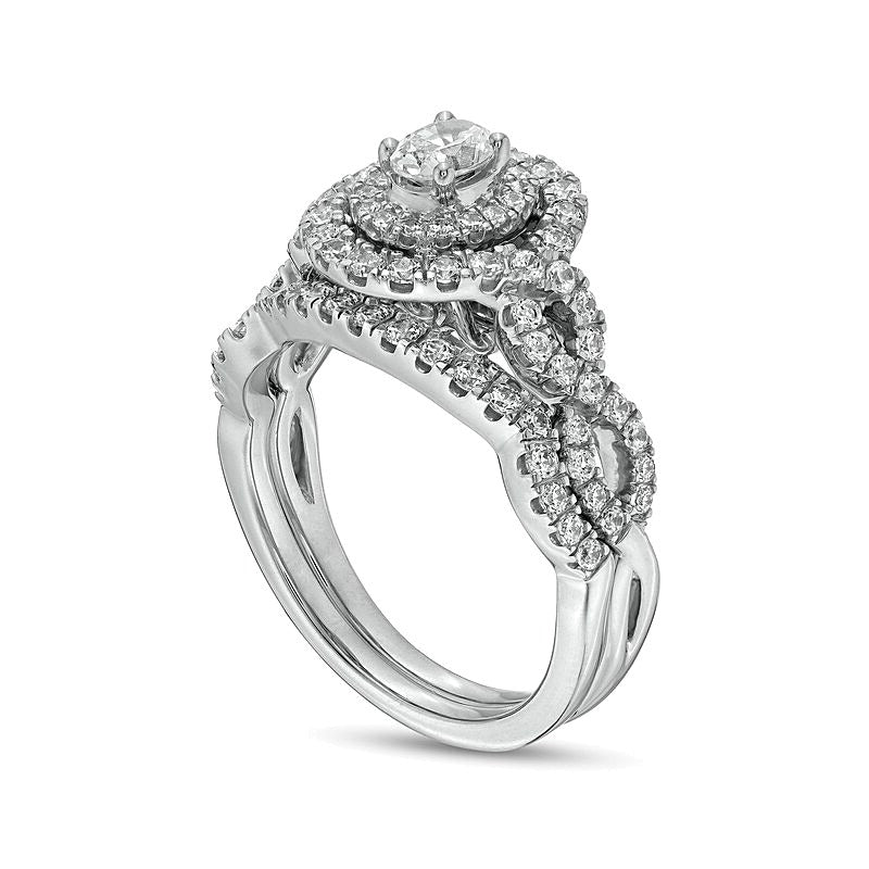 1.0 CT. TW Oval Diamond Double Frame Twist Shank Bridal Set in 14K White Gold